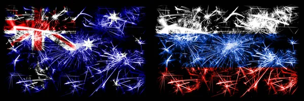 Australia, Ozzie vs Rusia, celebración del Año Nuevo ruso brillante banderas de fuegos artificiales concepto de fondo. Combinación de dos banderas de estados abstractos . — Foto de Stock