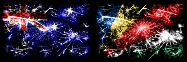 Australien, ozzie vs seychelles, seychelloise Neujahrsfeier funkelnden Feuerwerk Flaggen Konzept Hintergrund. Kombination aus zwei abstrakten Staaten Flaggen. — Stockfoto