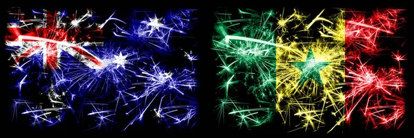 澳大利亚，欧齐对塞内加尔，塞内加尔新年庆祝闪耀烟花的概念背景。 两种抽象状态标志的组合. — 图库照片
