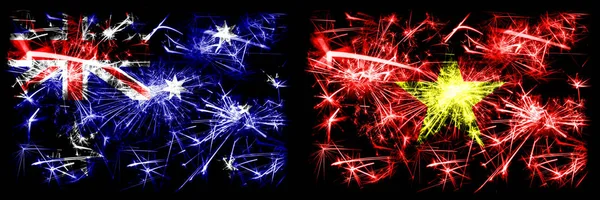 호주, 오지 vs 베트남, 베트남 새해 축하 불꽃놀이 컨셉트 배경. 두 개의 추상 국가가 결합 된 깃발. — 스톡 사진