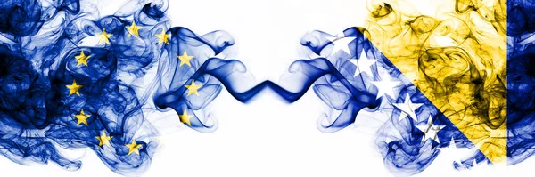 Europa, Europeiska unionen kontra Bosnien och Hercegovina, bosniska rökiga mystiska flaggor placerade sida vid sida. Tjock färgad silkeslen abstrakt rök flaggor kombination — Stockfoto