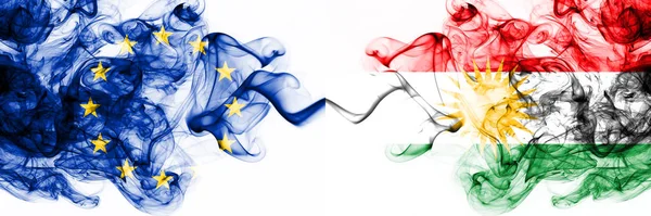 Eu, Europese Unie vs Koerdistan, Koerdische rokerige mystieke vlaggen naast elkaar geplaatst. Dikke gekleurde zijdeachtige abstracte rookvlaggen combinatie — Stockfoto