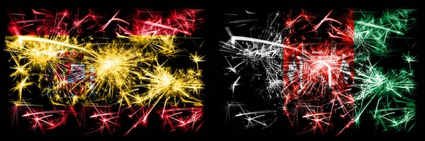 Španělsko vs Afghánistán, Afghánistán Nový rok oslavy jiskřící zábavní pyrotechnika vlajky koncept pozadí. Kombinace dvou abstraktních stavových příznaků. — Stock fotografie