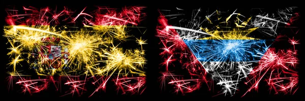 Spanisch vs Antigua und Barbuda Neujahrsfeier funkelnden Feuerwerk Flaggen Konzept Hintergrund. Kombination aus zwei abstrakten Staaten Flaggen. — Stockfoto