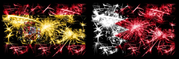 스페인 vs 바레인, 바하 라니 새해 축하 불꽃 깃발 컨셉트 배경. 두 개의 추상 국가가 결합 된 깃발. — 스톡 사진
