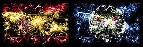 Español vs Belice, Belice celebración de Año Nuevo brillante banderas de fuegos artificiales concepto de fondo. Combinación de dos banderas de estados abstractos . —  Fotos de Stock