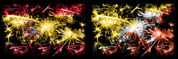 Spanish vs Bhutan, Bhutanese New Year celebration sparkling fireworks flags concept background. Combination of two abstract states flags. — Stock Photo, Image