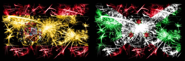 Spanish vs Burundi, celebración del Año Nuevo de Burundi con brillantes banderas de fuegos artificiales fondo concepto. Combinación de dos banderas de estados abstractos . —  Fotos de Stock