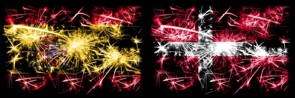 Español vs Dinamarca, celebración del Año Nuevo danés brillante banderas de fuegos artificiales concepto de fondo. Combinación de dos banderas de estados abstractos . —  Fotos de Stock