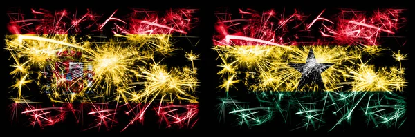 Spanisch vs ghana, ghanaische Neujahrsfeier funkelnden Feuerwerk Flaggen Konzept Hintergrund. Kombination aus zwei abstrakten Staaten Flaggen. — Stockfoto