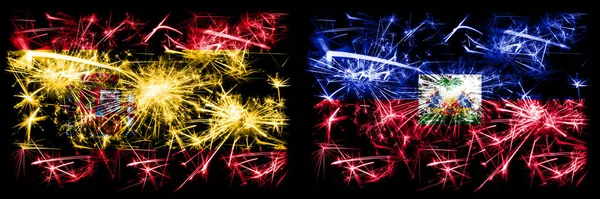 Іспанці проти Гаїті, гаїтянське святкування Нового року, яке яскраво освітлює феєрверки, відзначають тло. Комбінація двох абстрактних держав прапори. — стокове фото