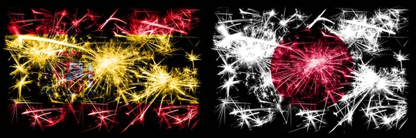 스페인 vs 일본, 일본 신년 축하 폭죽 플래그 컨셉 배경. 두 개의 추상 국가가 결합 된 깃발. — 스톡 사진