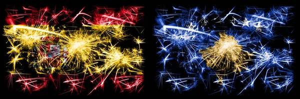 Spanisch vs kosovo, serbia Neujahrsfeier funkelnden Feuerwerk Flaggen Konzept Hintergrund. Kombination aus zwei abstrakten Staaten Flaggen. — Stockfoto