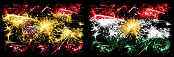 Hiszpański vs Kurdystan, Kurdyjski Nowy Rok świętować musujące fajerwerki flagi tle koncepcji. Połączenie dwóch flag stanów abstrakcyjnych. — Zdjęcie stockowe