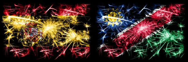 西班牙对纳米比亚，纳米比亚新年庆祝闪烁着焰火旗的概念背景。 两种抽象状态标志的组合. — 图库照片