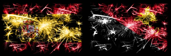 Español vs Papúa Nueva Guinea Año Nuevo celebración brillante banderas de fuegos artificiales concepto de fondo. Combinación de dos banderas de estados abstractos . —  Fotos de Stock