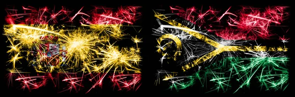스페인 vs 바누아투 새해 기념행사에서는 불꽃놀이 깃발 이 등장 한다. 두 개의 추상 국가가 결합 된 깃발. — 스톡 사진