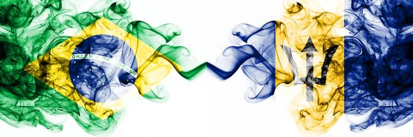 Brazil, Brazilian vs Barbados, Barbadian smoky mystic flags placed side by side. Thick colored silky abstract smoke flags combination