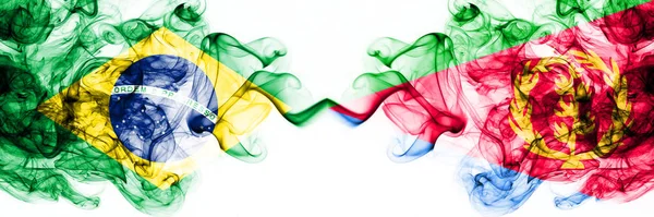 Brasile, Brasile vs Eritrea bandiere mistiche fumose affiancate. Combinazione di bandiere di fumo astratte spesse colorate e setose — Foto Stock