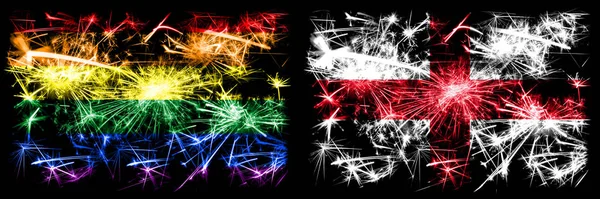 Gay pride vs England, English New Year celebration sparkling fireworks flags concept background. Abstract combination of two flags. — Stock Photo, Image