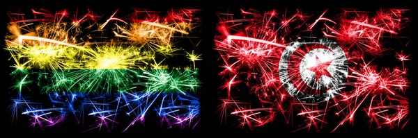 Gay pride vs Tunisia, Tunisian New Year celebration sparkling fireworks flags concept background. Abstract combination of two flags. — Stock Photo, Image