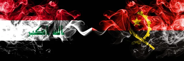 伊拉克 伊拉克对安哥拉 安哥拉烟熏神秘的旗帜并排放置 浓密的彩色丝质烟旗连在一起 — 图库照片