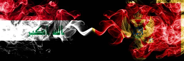 伊拉克 伊拉克对黑山 黑山烟熏神秘的旗帜并排放置 浓密的彩色丝质烟旗连在一起 — 图库照片