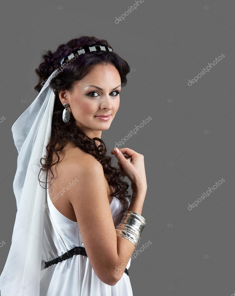 Ancient Greece, a woman in a white dress with a smile Stock Photo by  ©zadiraka 124886734