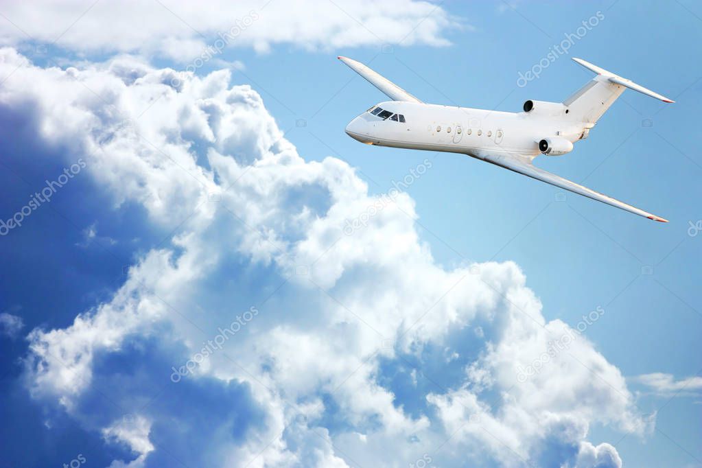Passenger plane in the sky among the clouds. The concept of holidays and travel. Air transport travel