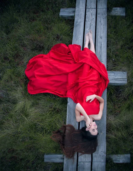 Woman posing in a bog — Stock Photo, Image