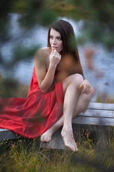 Woman posing in a bog — Stock Photo, Image