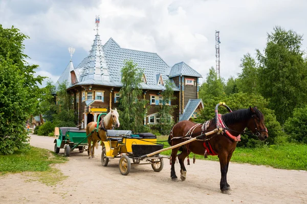 Old carriage in russian tourist center Verhnie Mandrogi