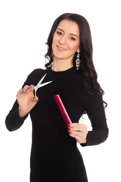 Girl hairdresser holding scissors and comb — Stock Photo, Image