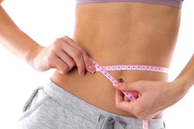 Sportif kadın beline ölçme