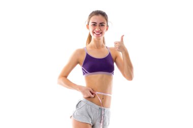 Sportif kadın beline ölçme