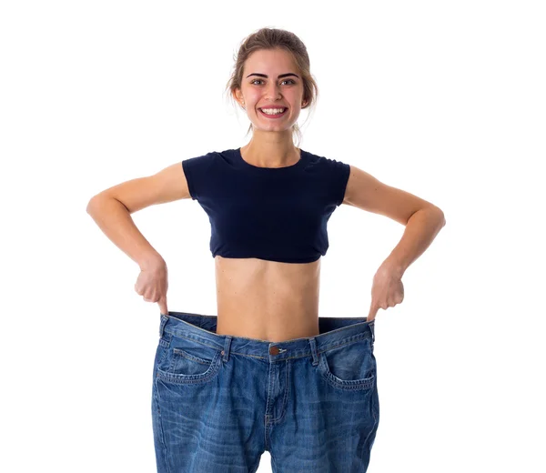多くのより大きいサイズのジーンズを着ている女性 — ストック写真