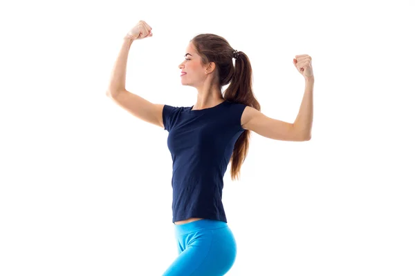 Lachende vrouw toont biceps — Stockfoto