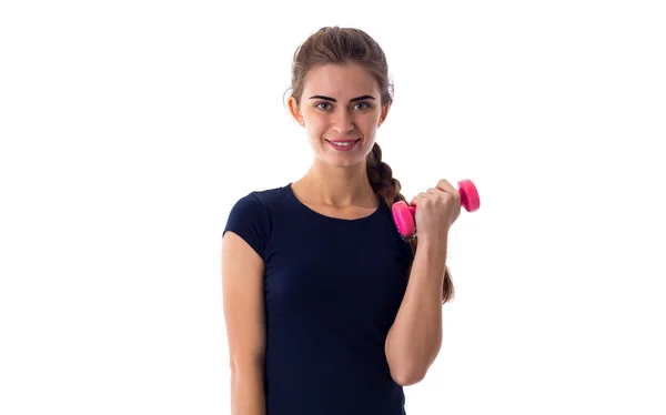 Lachende vrouw met een halter — Stockfoto