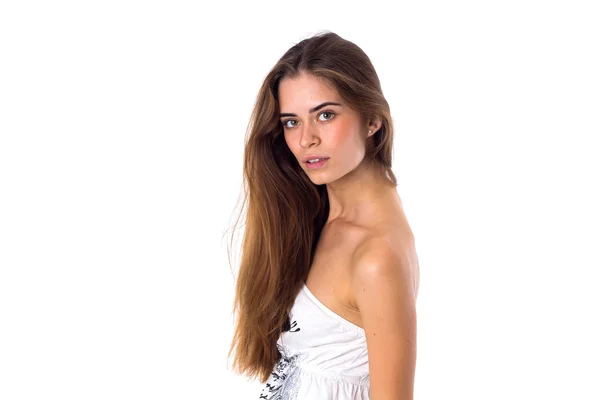 Woman in white dress with long hair — Stockfoto