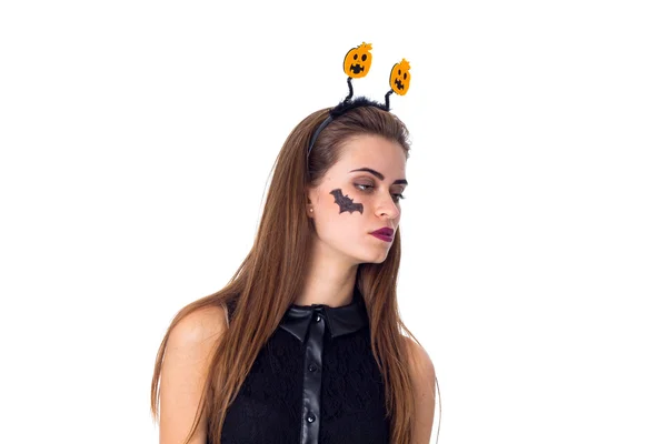 Mulher na cabeça com abóboras — Fotografia de Stock