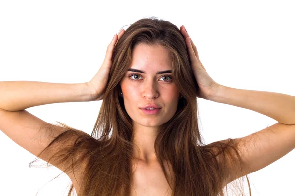 Woman holding hands at her head — Stock Photo, Image