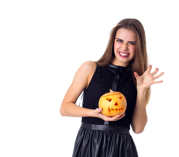 Mujer sosteniendo una calabaza — Foto de Stock