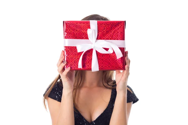 Young woman hiding her face by the present — Stock Photo, Image