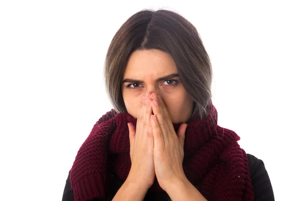 Woman with scarf sneezing — Stock Photo, Image