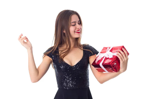 Young woman holding a present — Stock Photo, Image