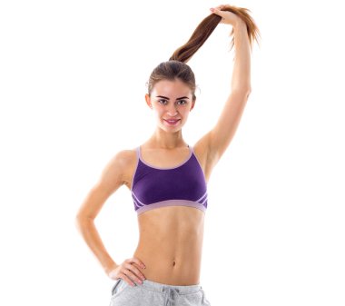 Onun at kuyruğu tutan atletik kadın