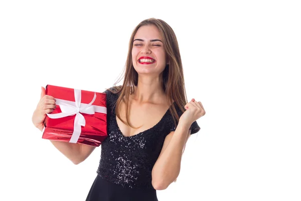 Young woman holding a present — Stock Photo, Image