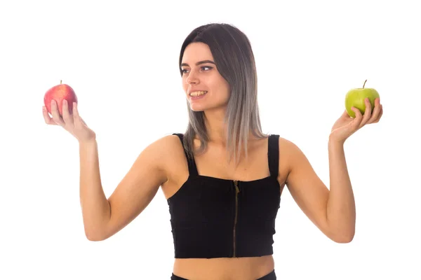 Kadın tutan iki elma — Stok fotoğraf