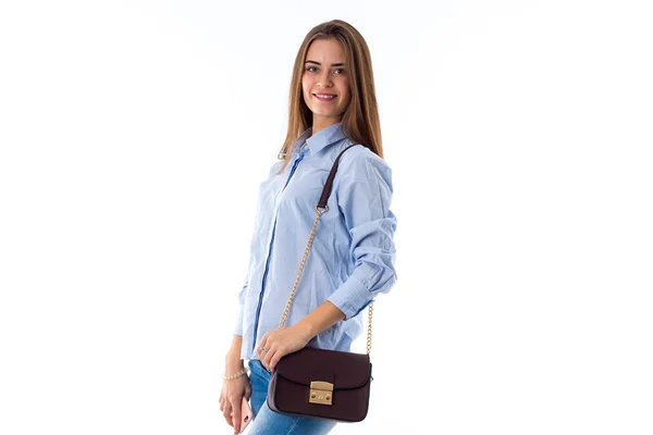 Woman in blue shirt with bag — 스톡 사진