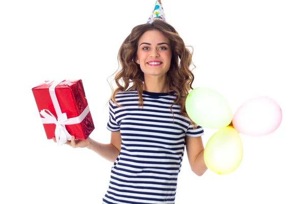 Mujer sosteniendo presente y globos —  Fotos de Stock